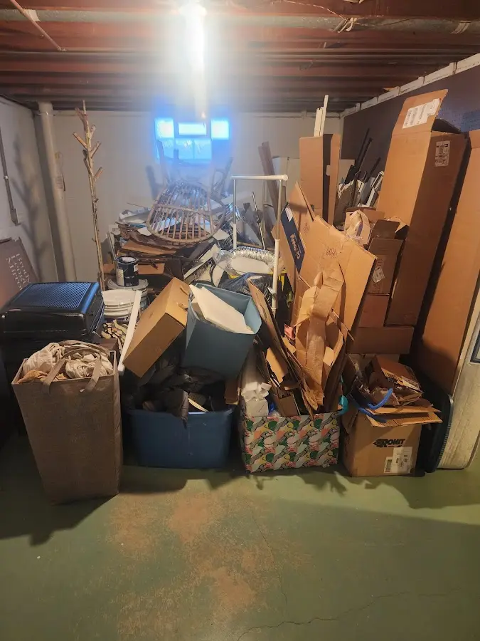 Roll-off dumpster container at job site for 4 Yard Dumpster Rental in Sevierville